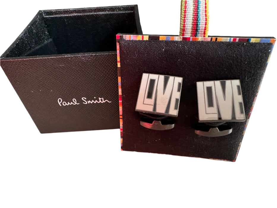 Paul Smith Cufflinks "LOVE" in white lettering on black background